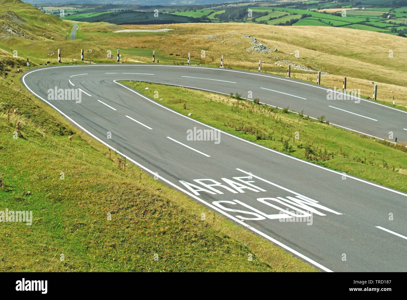 Country Road Bilingual Safety Markings Slow Down Signs On Highway