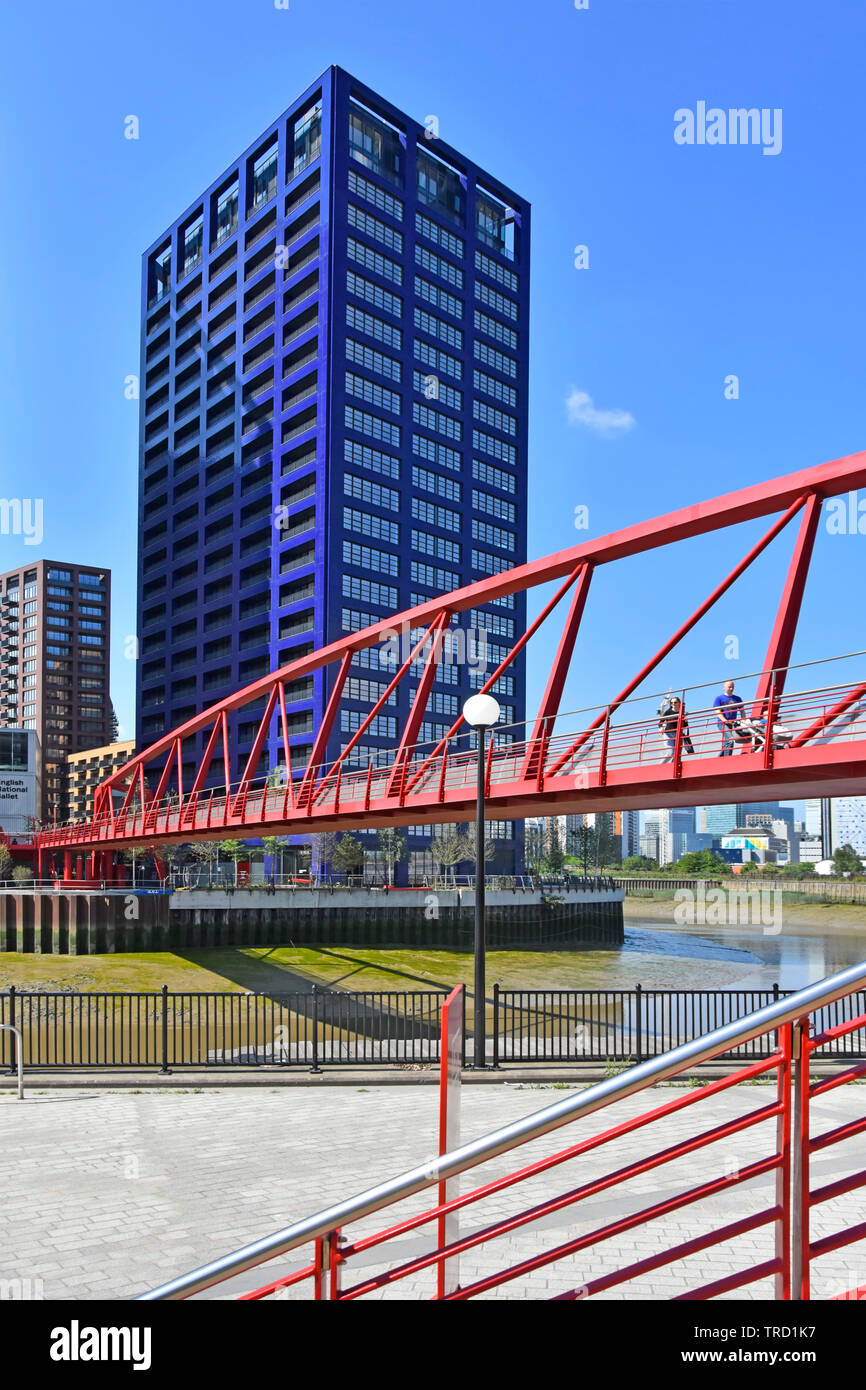 New public single span pedestrians foot bridge over River Lea links east London City Island apartment housing & offices to Canning Town DLR station UK Stock Photo