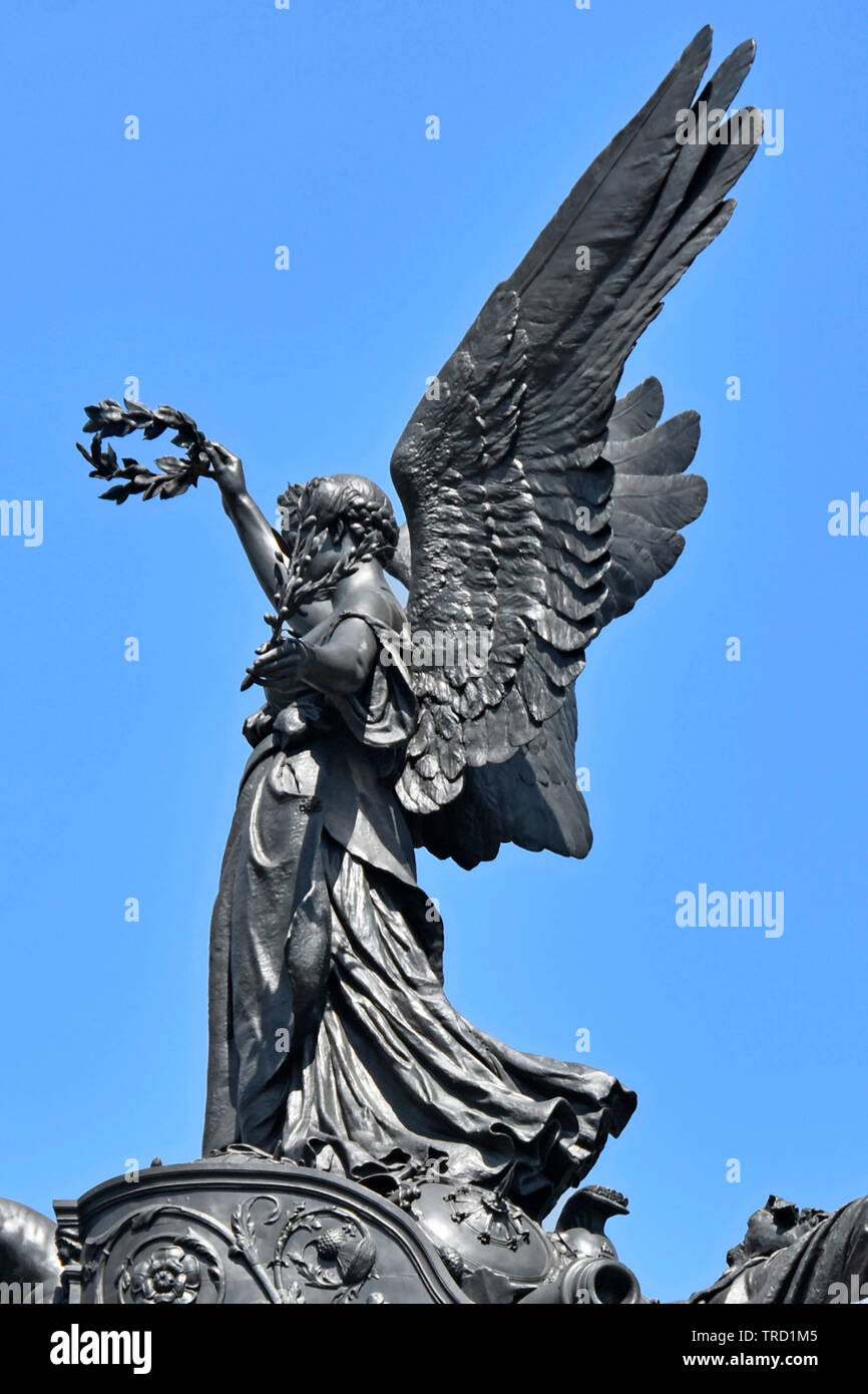 Part of Wellington Arch bronze quadriga sculpture close up of Nike the  winged goddess of victory with laurel wreath Hyde Park Corner London  England UK Stock Photo - Alamy