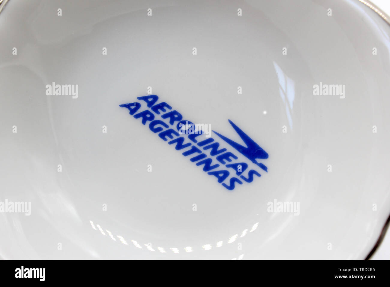 Aerolineas Argentinas, logo on porcelain plate, isolated on a white background Stock Photo