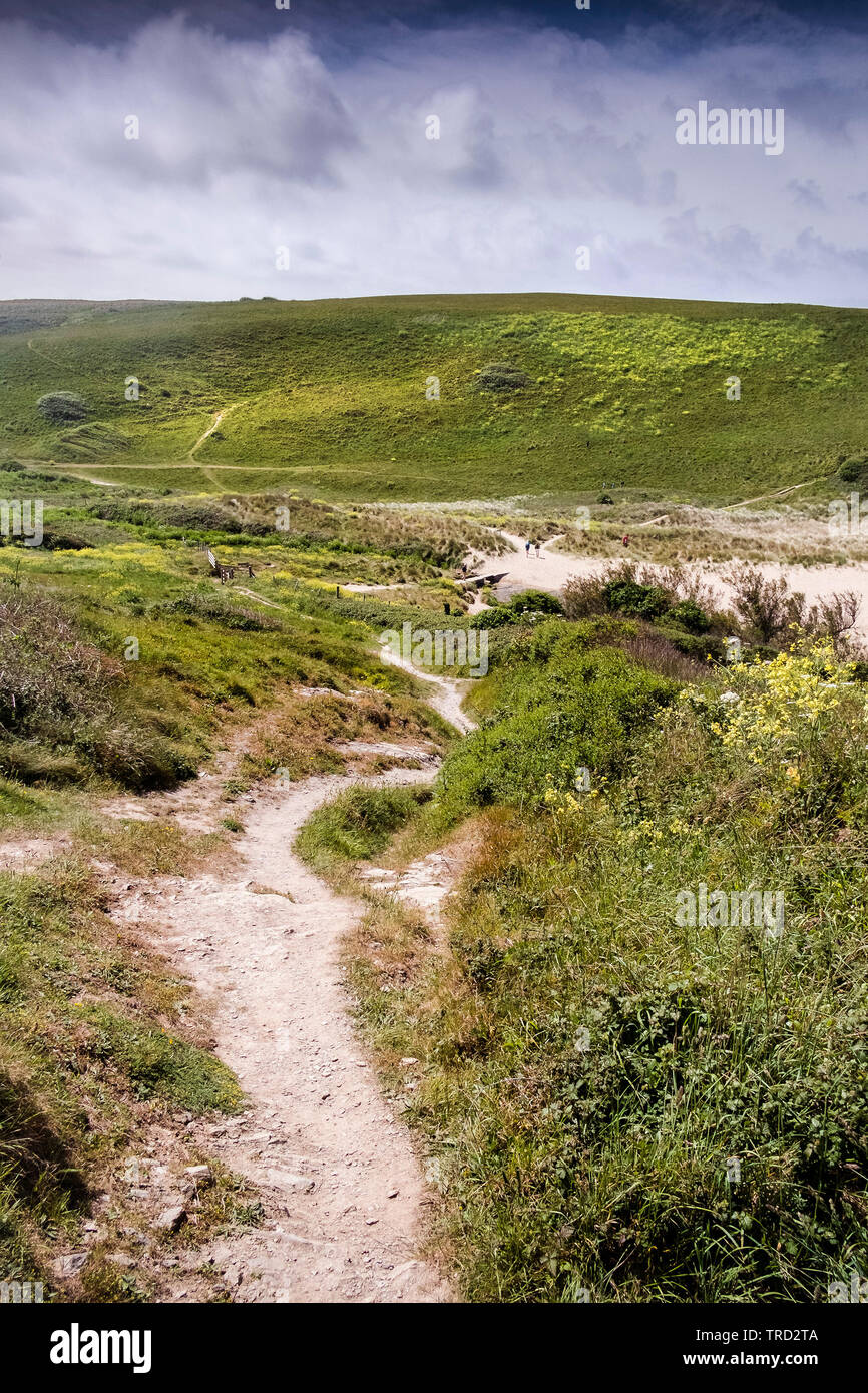 The path leading down to Polly Porth Joke in Newquay in Cornwall. Stock Photo