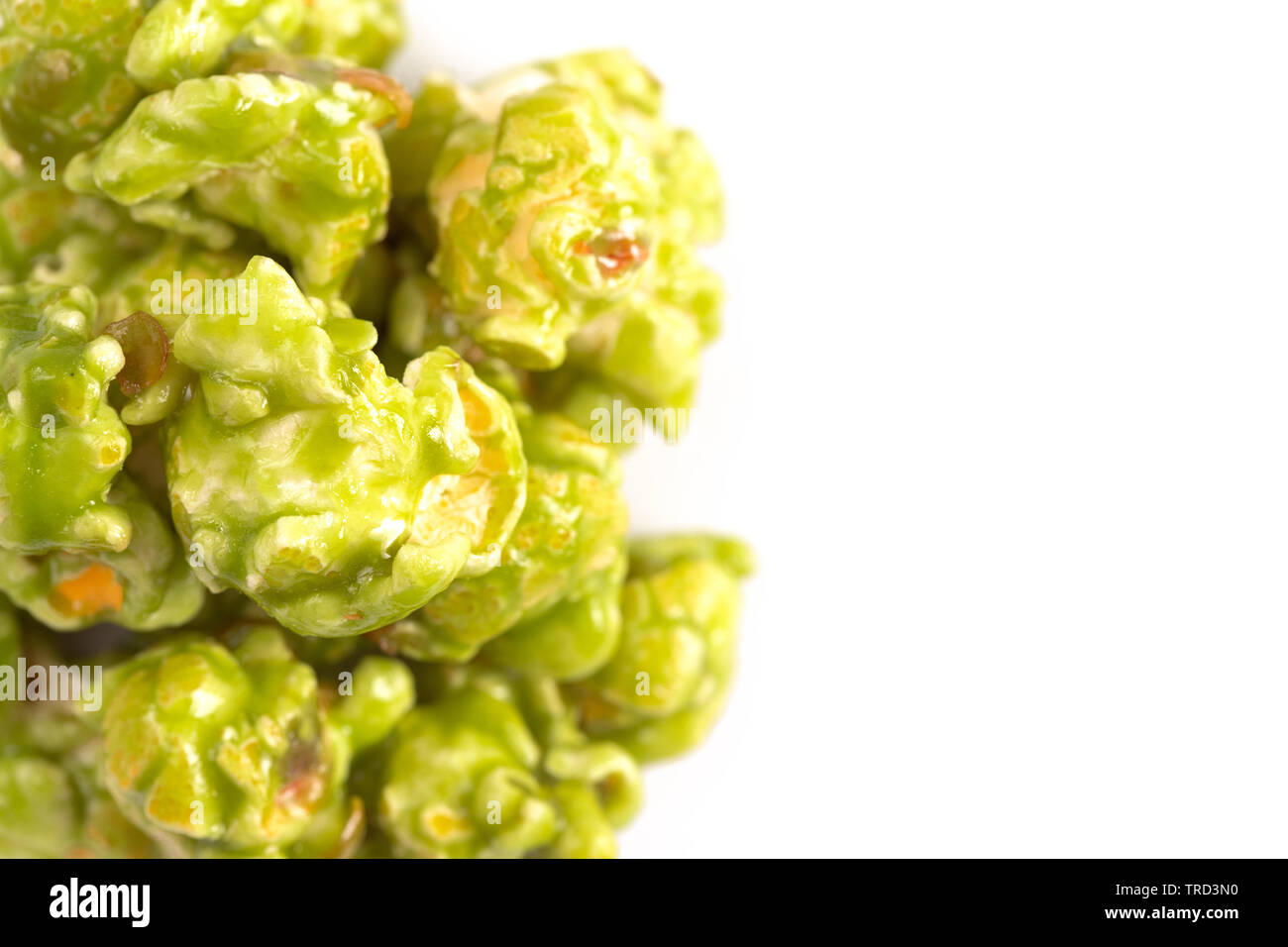 Lime Flavored Popcorn on a White Background Stock Photo