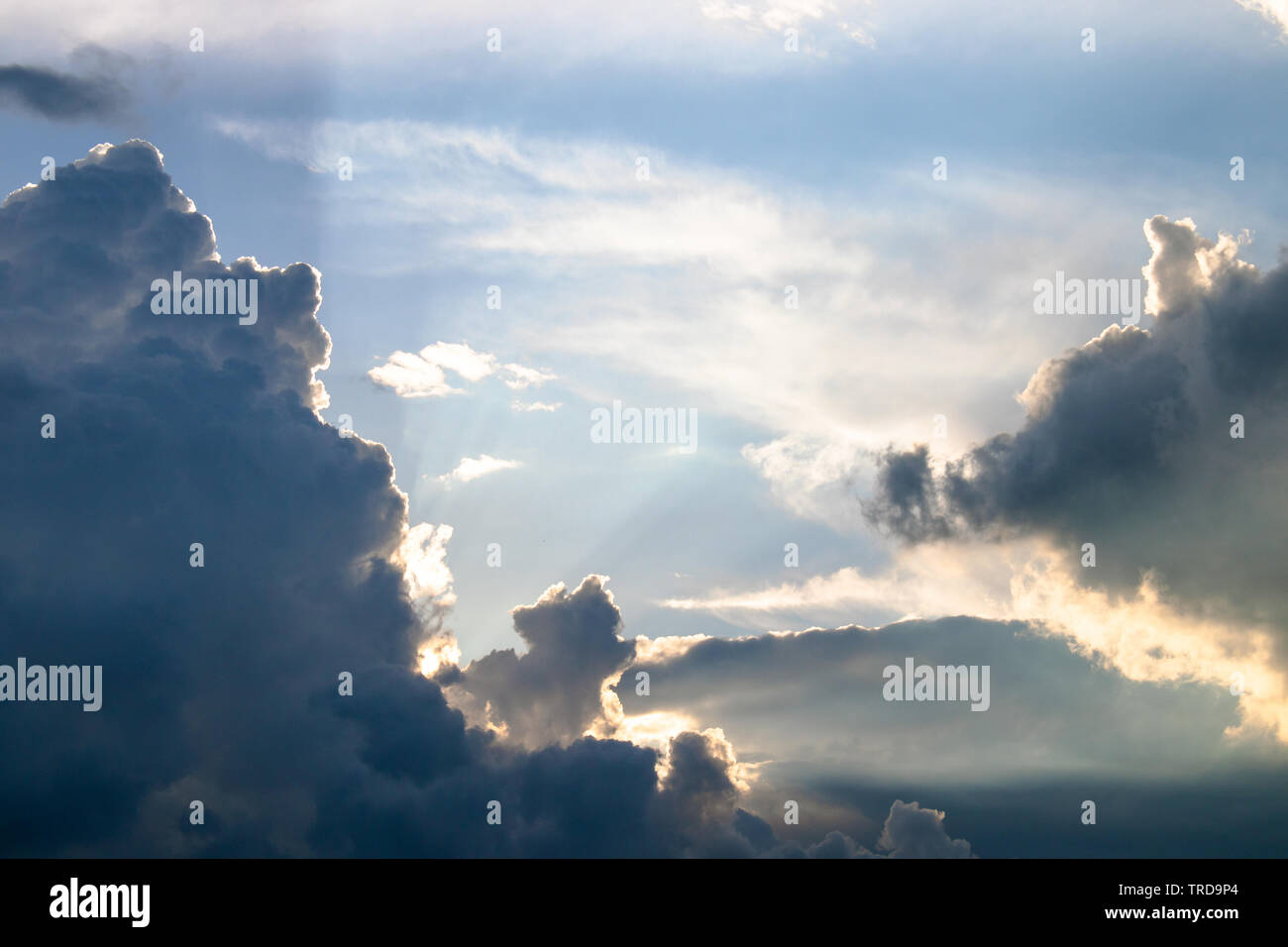 Cumulus at sunset Sky with different types of clouds Stock Photo - Alamy