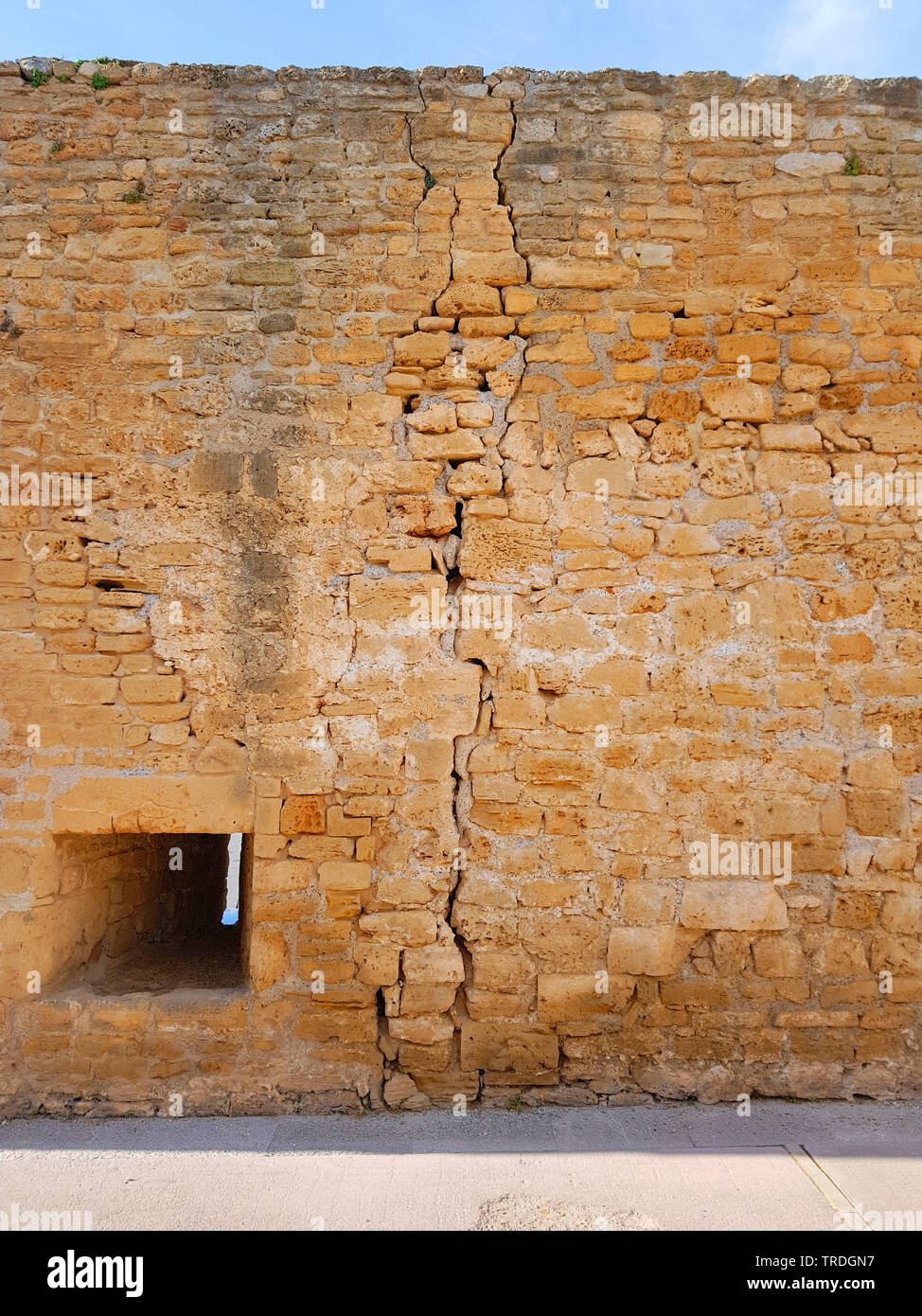 crack in a wall with a embrasure, Spain, Balearic Islands, Majorca, Alcudia Stock Photo