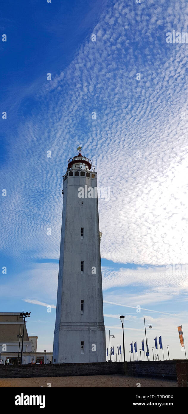 Noordwijk lighthouse and clouds, Altocumulus stratiformis , Netherlands, Noordwijk aan Zee Stock Photo
