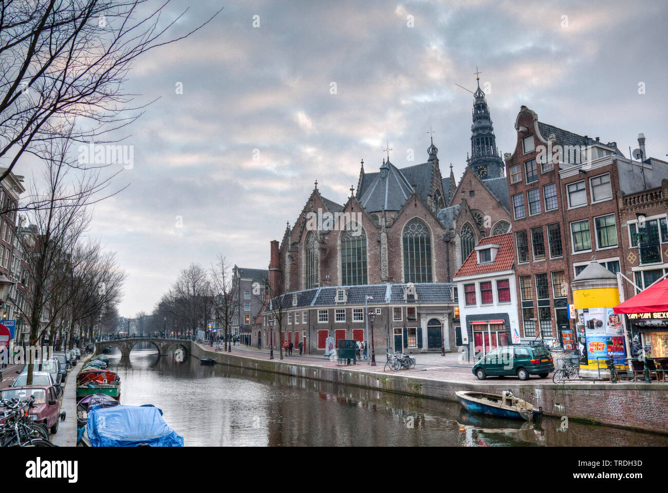 canal and Oude Kerk in the inner city, Netherlands, Amsterdam Stock Photo