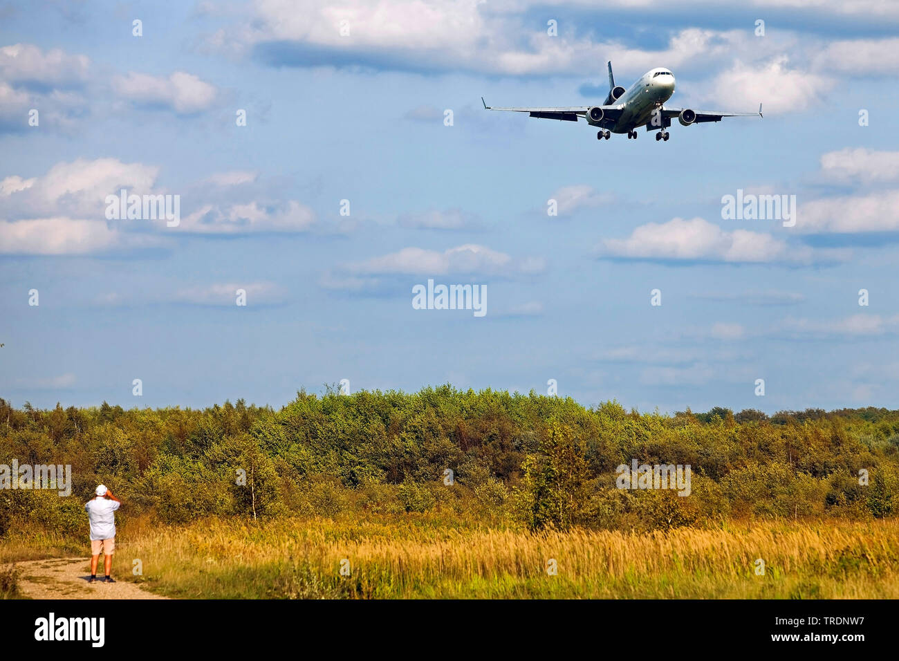 airplane above the Wahrner Heide, approach for landing to the Cologne Bonn Airport, Germany, North Rhine-Westphalia, Cologne Stock Photo