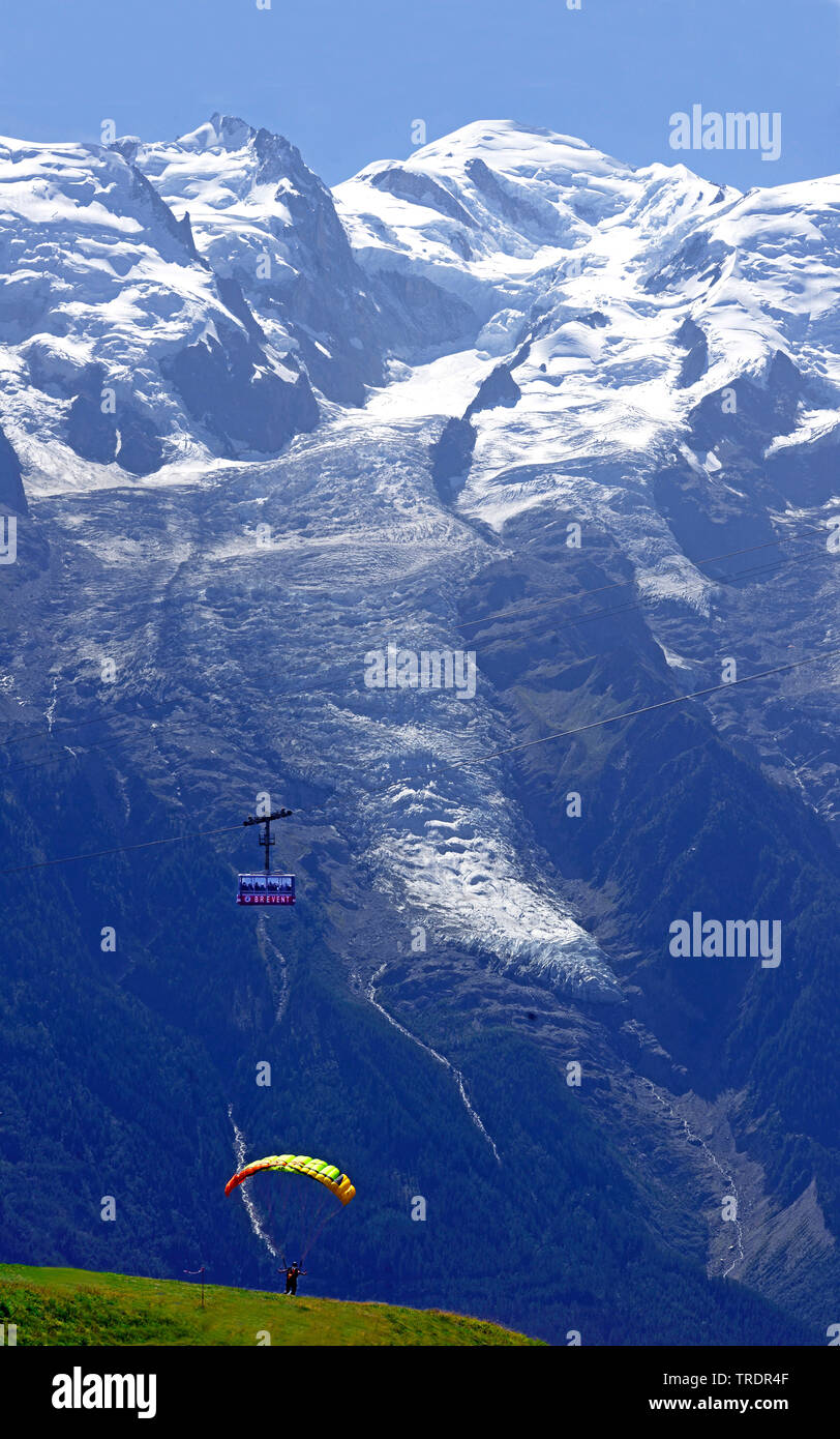 Paragliding and cablecar Telepherique du Brevent in front of the Mont Blanc massif, France, Savoie, Chamonix Stock Photo