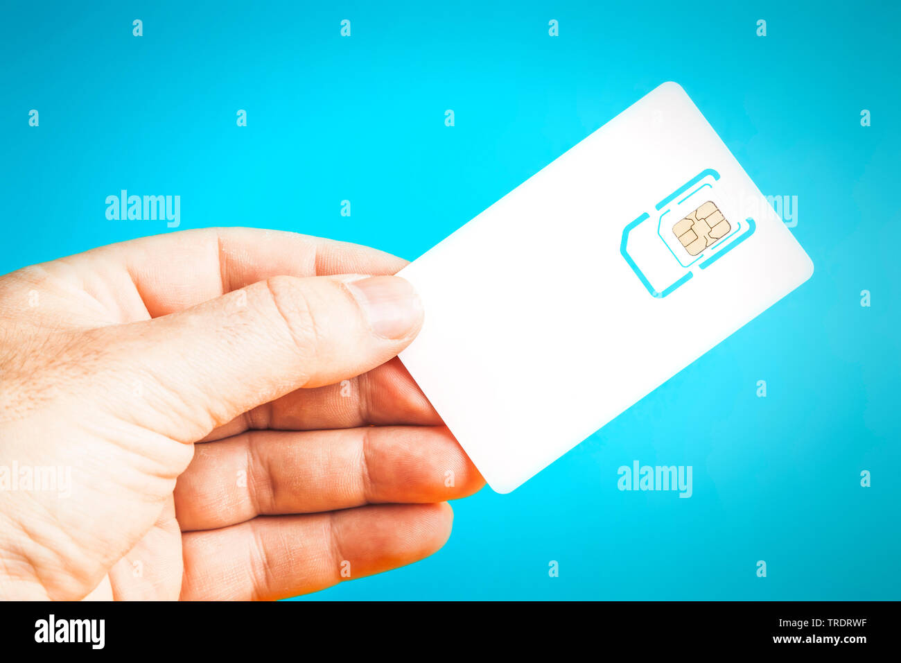 hand with smart card for cell phones Stock Photo Alamy