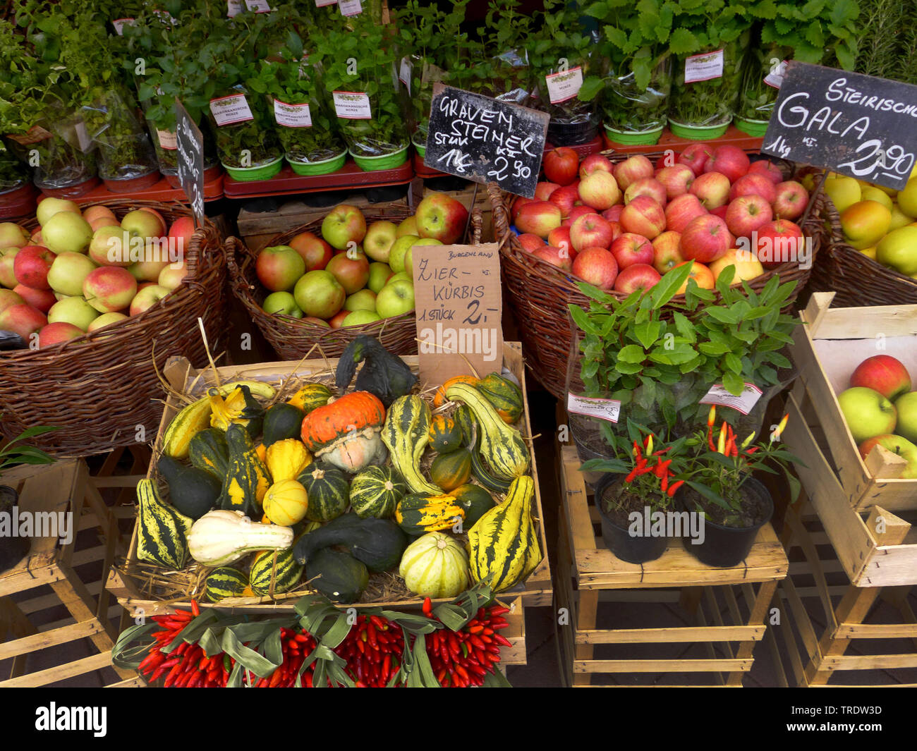market stand with fruits, potherbs and ornamental pumpkins at the weekly market, healthy nutrition, Germany Stock Photo