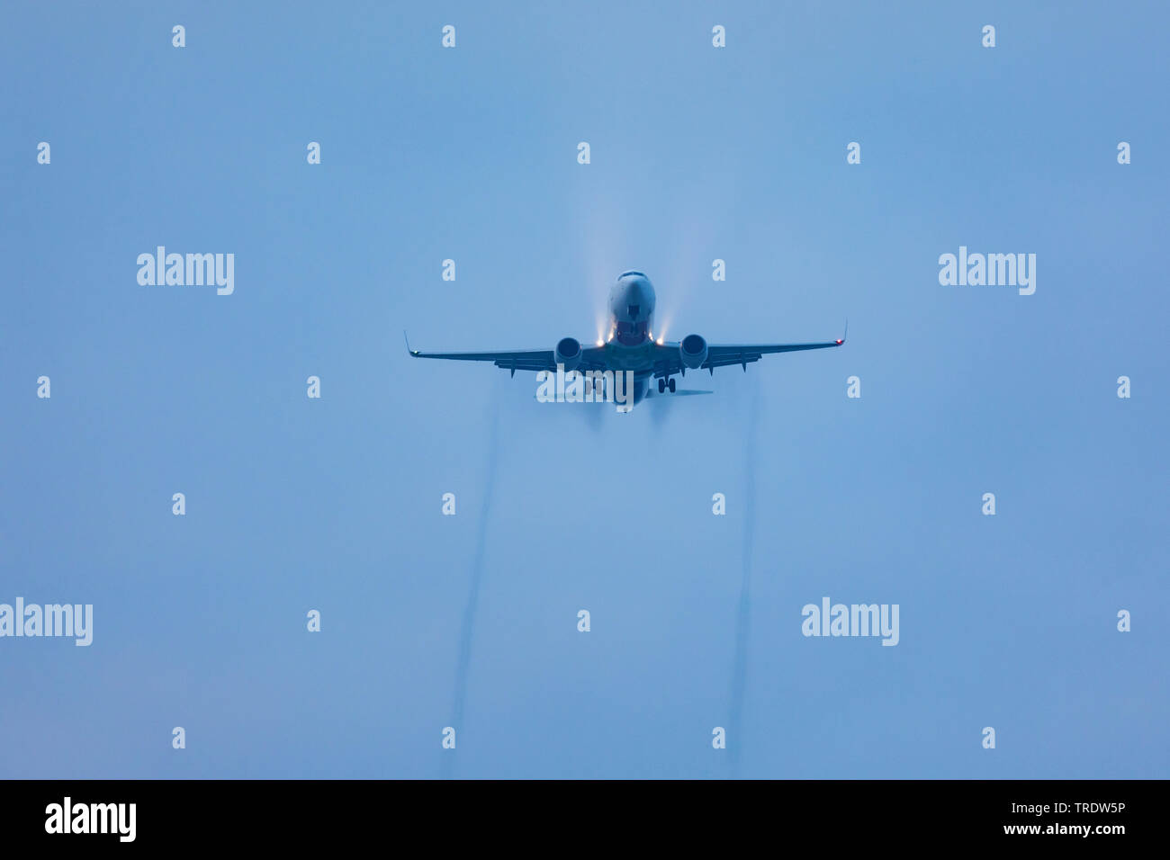 Airbus approach for landing in rain, Germany, Bavaria, Flughafen Muenchen Stock Photo