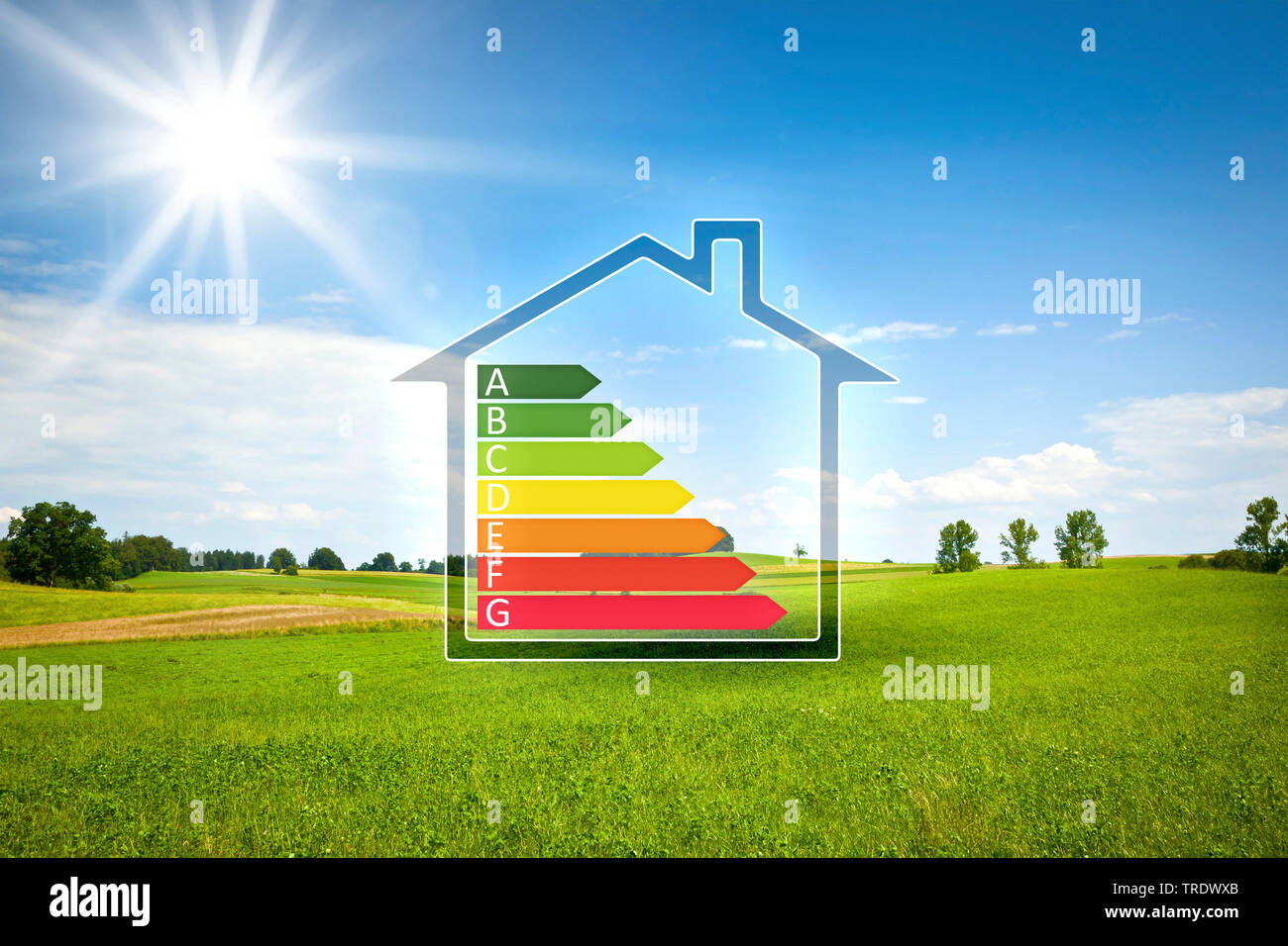 Sign of European Union energy label for a residental house against background of green landscape Stock Photo