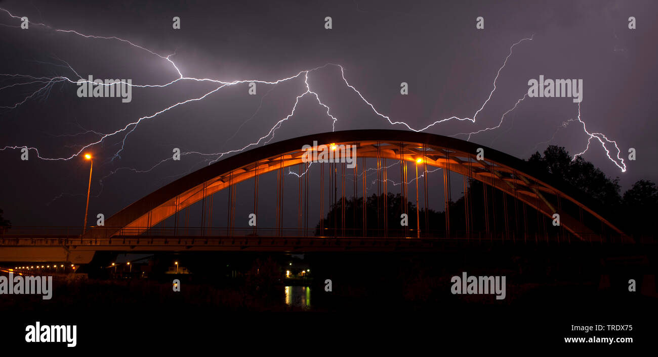 lightning above a bridge, Netherlands, Overijssel, Twentekanaal Goor Stock Photo