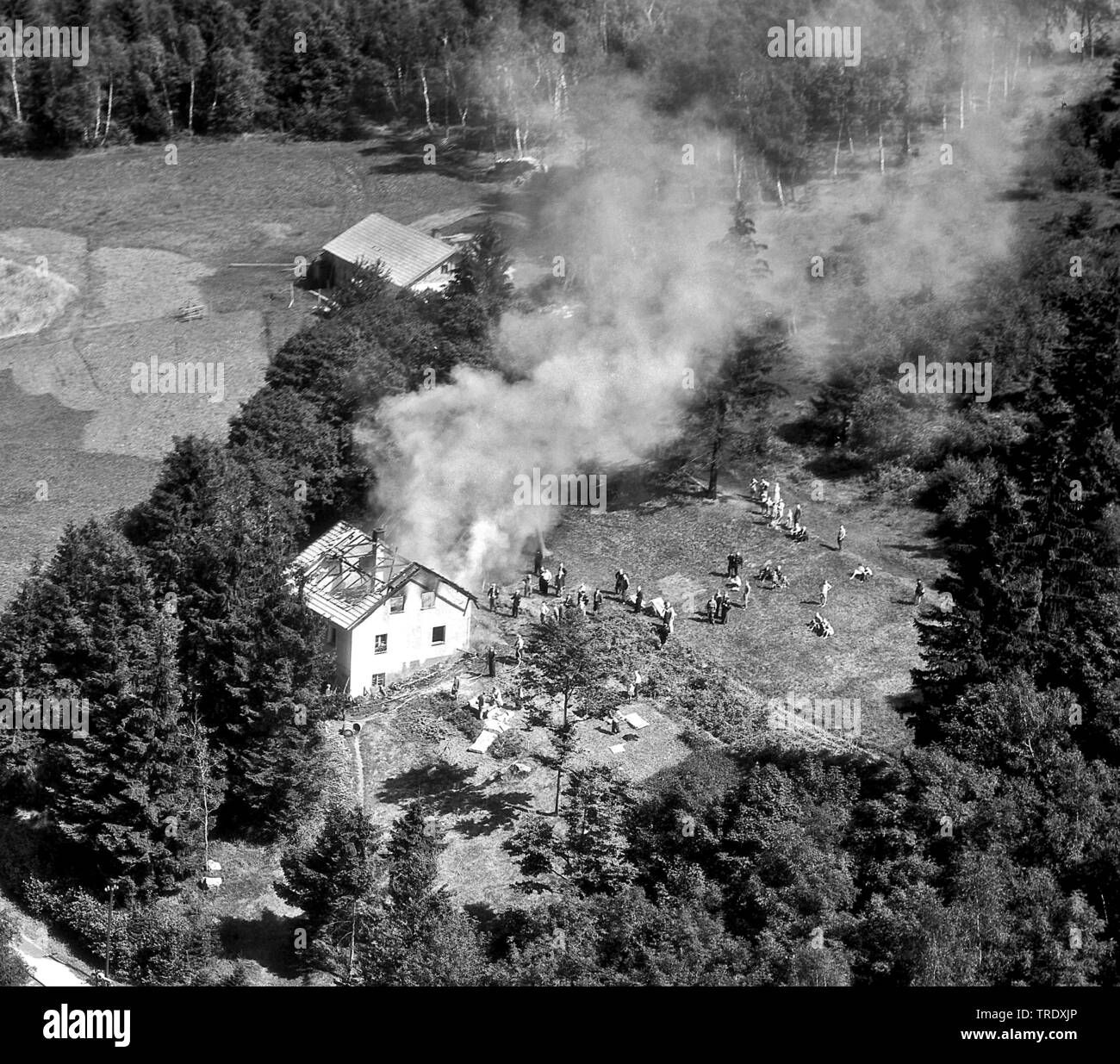 burning house at Rohrmuenz, aerial photo from the year 1960, Germany, Bavaria, Niederbayern, Lower Bavaria Stock Photo