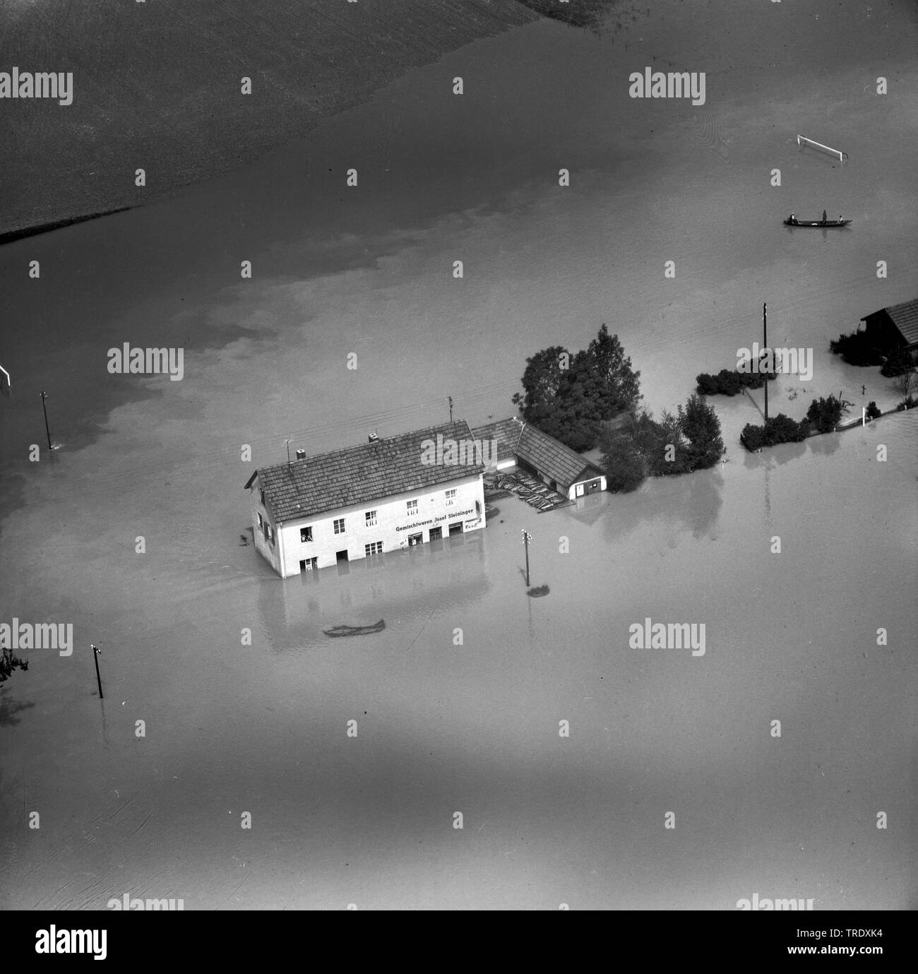 house at high water in Triebenbach from river Salzach, aerial photo from the year 1959, Germany, Bavaria, Niederbayern, Lower Bavaria, Triebenbach Stock Photo