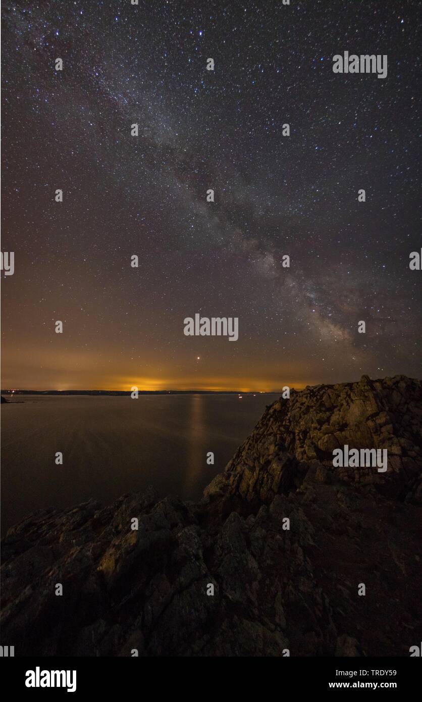 starry night above the Atlantic coast, France, Brittany, Crozon, Pointe de Penhir Stock Photo