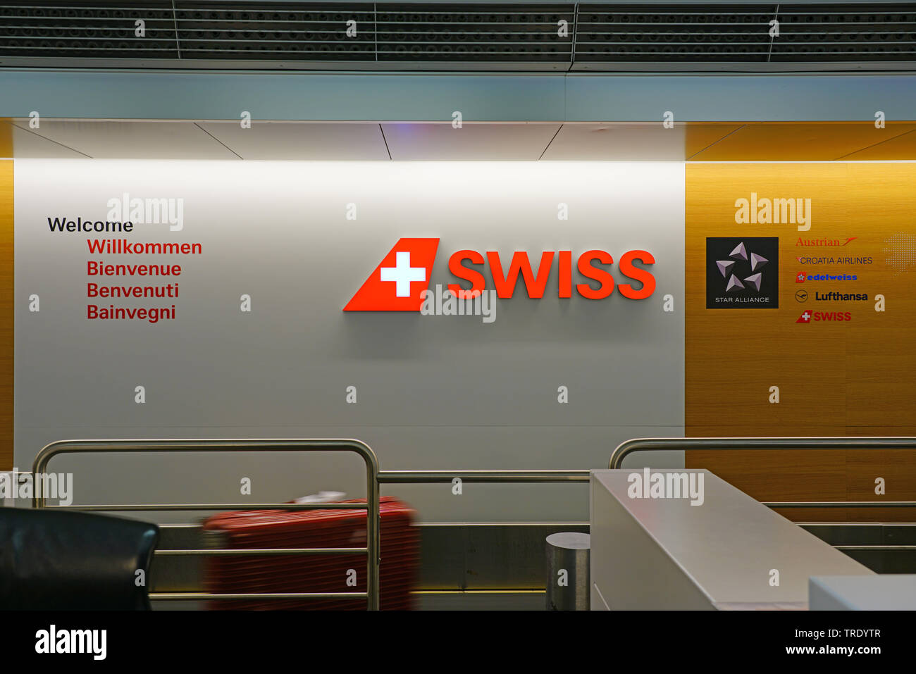 ZURICH, SWITZERLAND -25 MAY 2019- View of the logo of Swiss international airline Swiss (LX), a member of Star Alliance, at the Zurich airport (ZRH). Stock Photo