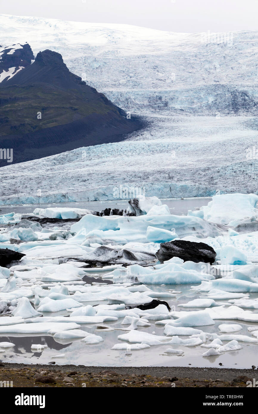 iceberg Fjallsarlon, glacier calving into the lagoon, Iceland, Vatnajoekull National Park Stock Photo