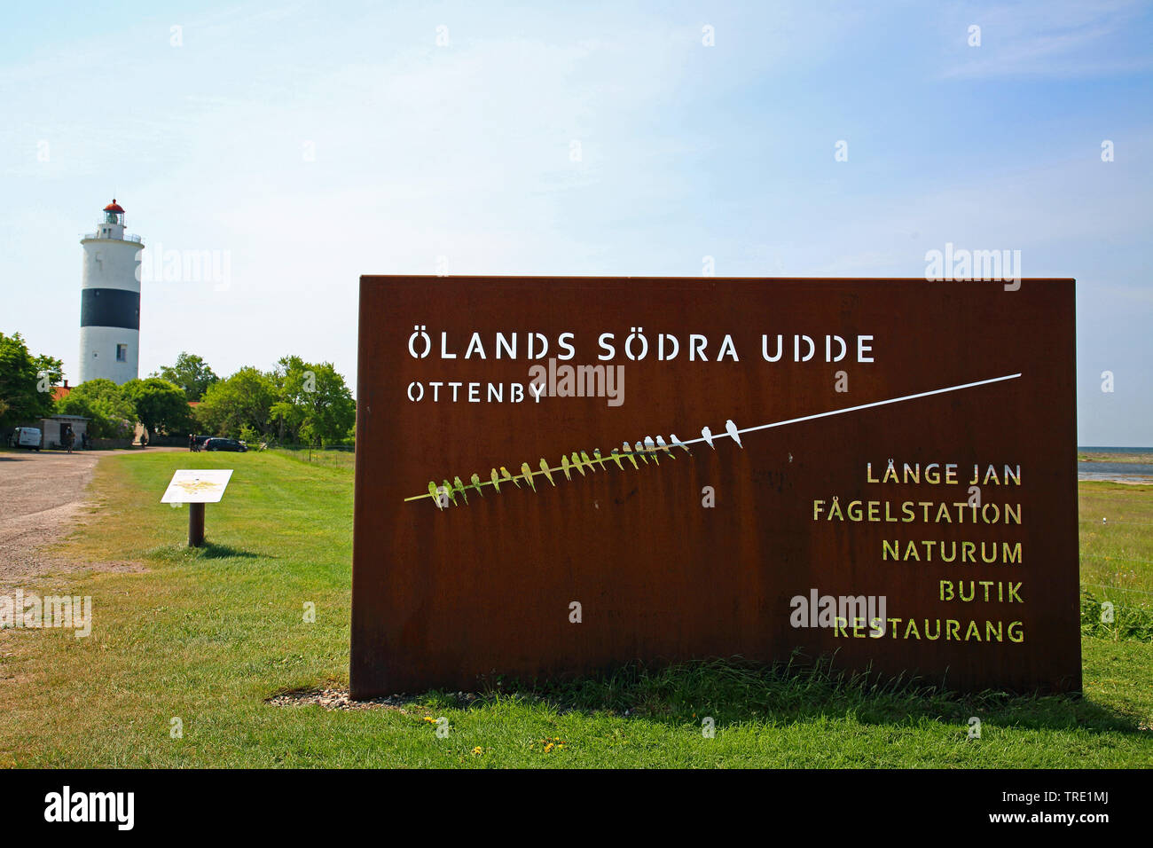 the south of Oeland with info sign and lighthouse Lange Jan, Sweden, Ottenby Stock Photo