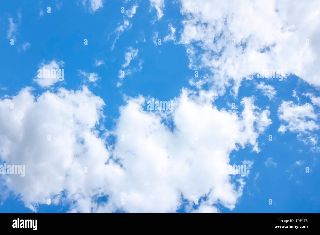 blue sky with white clouds in sunlight Stock Photo
