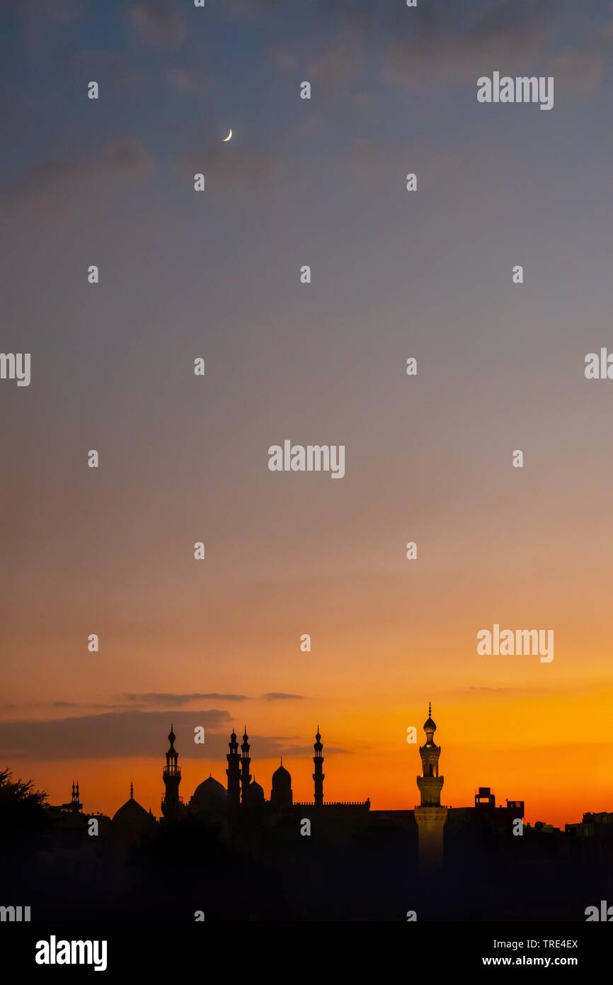 Cairo at sundown with the silhouette of the Al-Rifai and the Sultan Hassan mosques, Egypt, Kairo Stock Photo