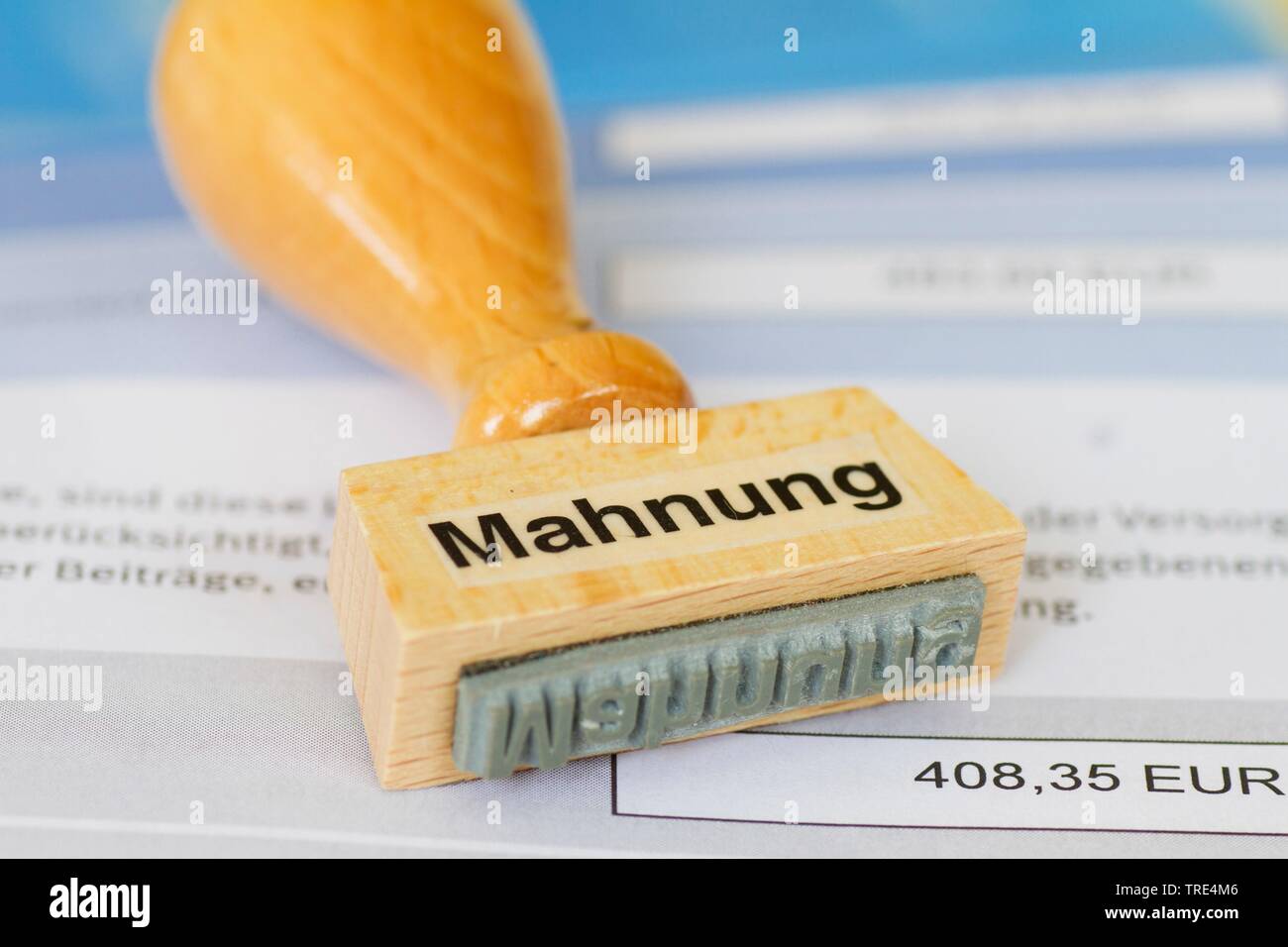 stamp lettering Mahnung, exhortation, Germany Stock Photo