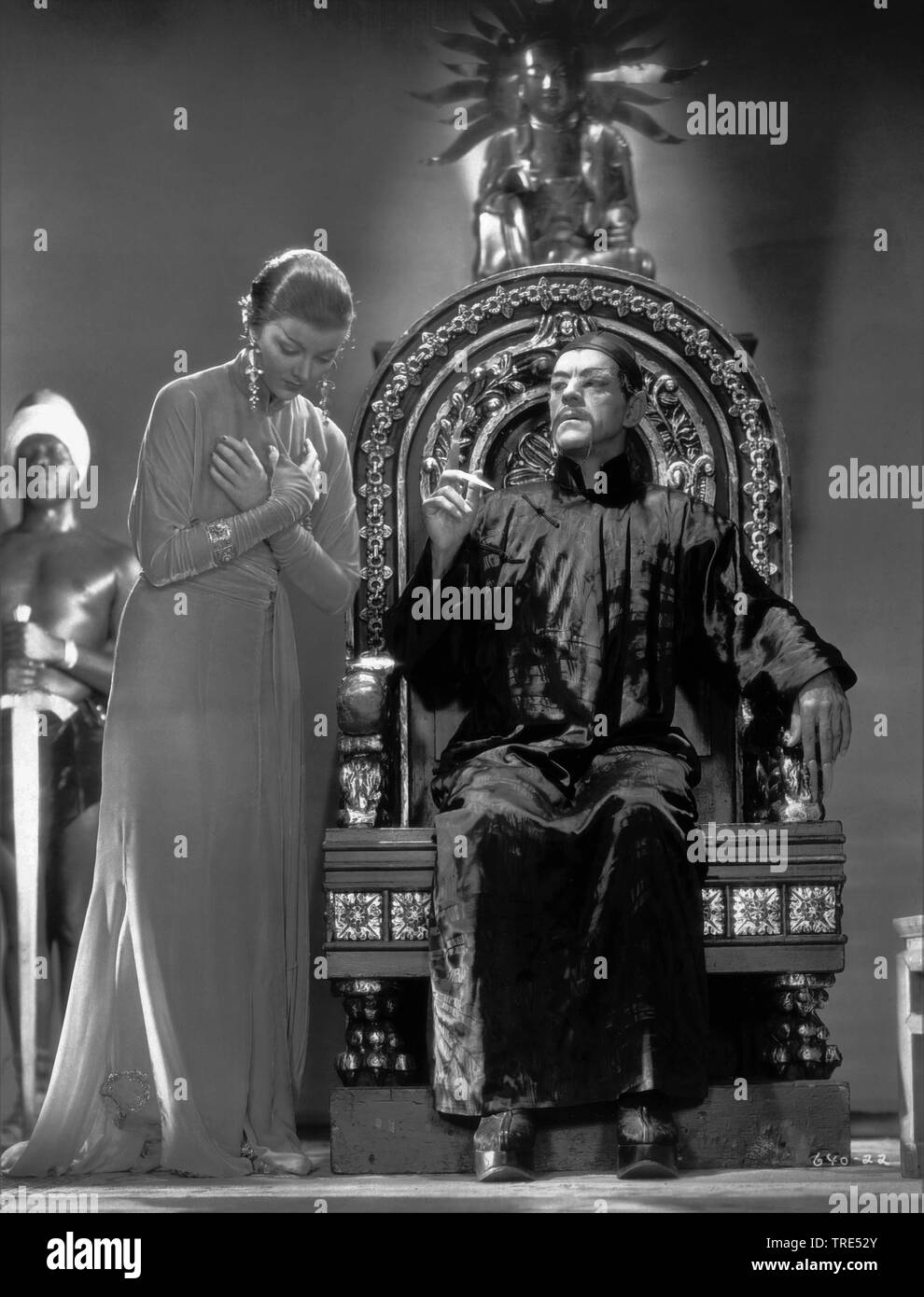 Boris Karloff as Dr. Fu Manchu Myrna Loy as his daughter THE MASK OF FU  MANCHU 1932 director Charles Brabin story Sax Rohmer costumes Adrian Metro  Goldwyn Mayer Stock Photo - Alamy