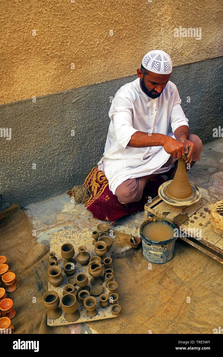 man doing pottery in the old town, United Arab Emirates, Deira, Dubai