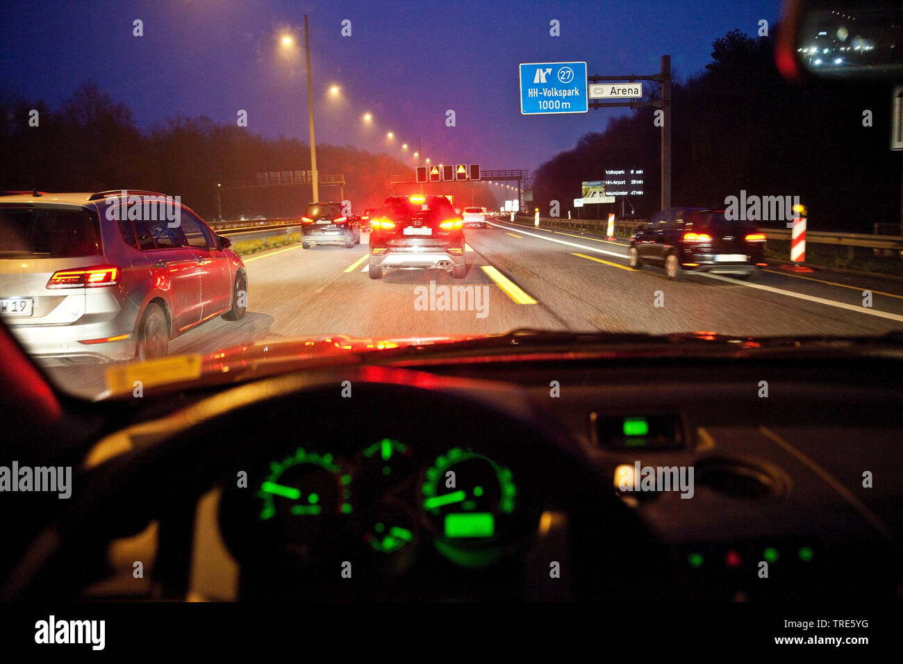 view out of the car to the traffic jam on the motorway in twilight, Germany, Lower Saxony, Soltau Stock Photo