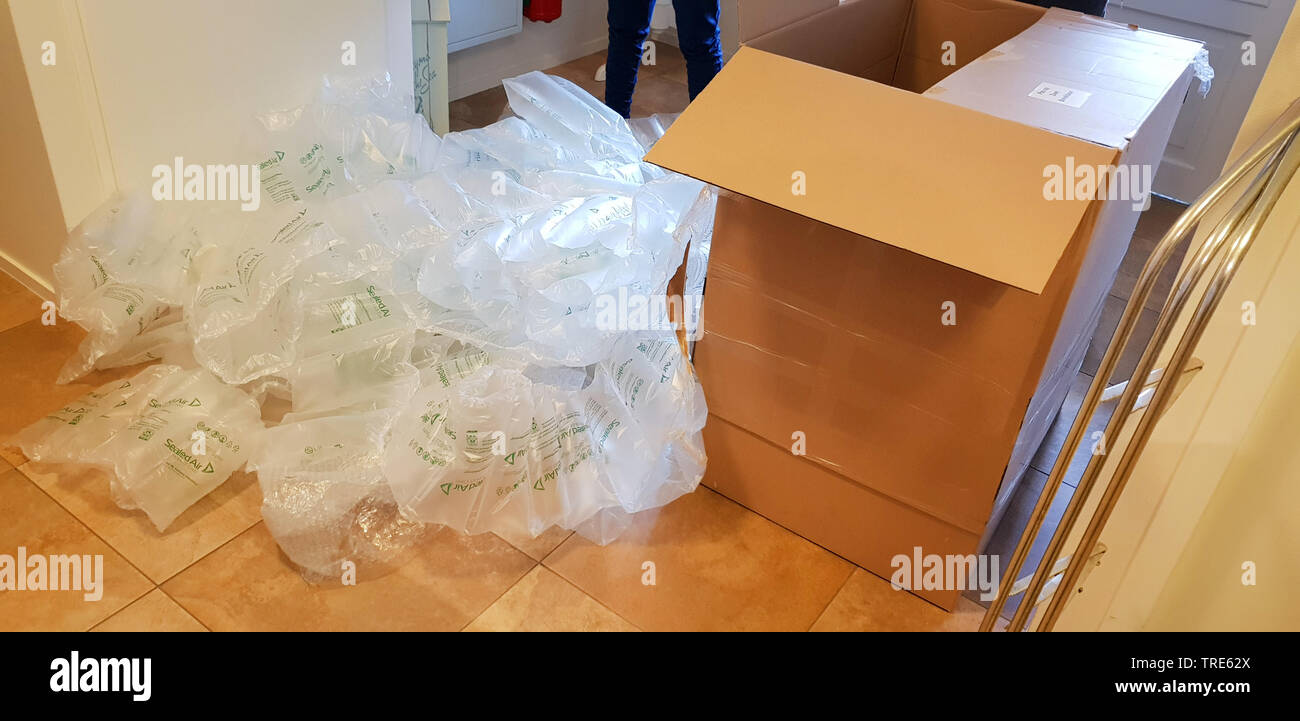 large amount of air cushions beside a package, Germany Stock Photo