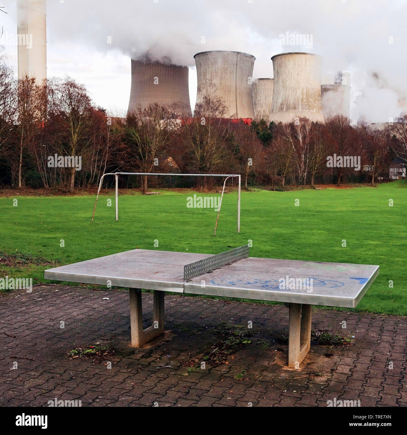 desolate sports ground of district Auenheim in front of brown coal power station Niederaussem, Germany, North Rhine-Westphalia, Bergheim Stock Photo