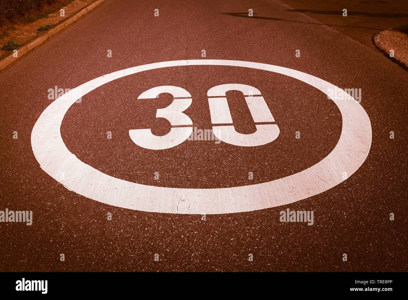mark on asphalt, speed limit of 30 km/h, Germany Stock Photo