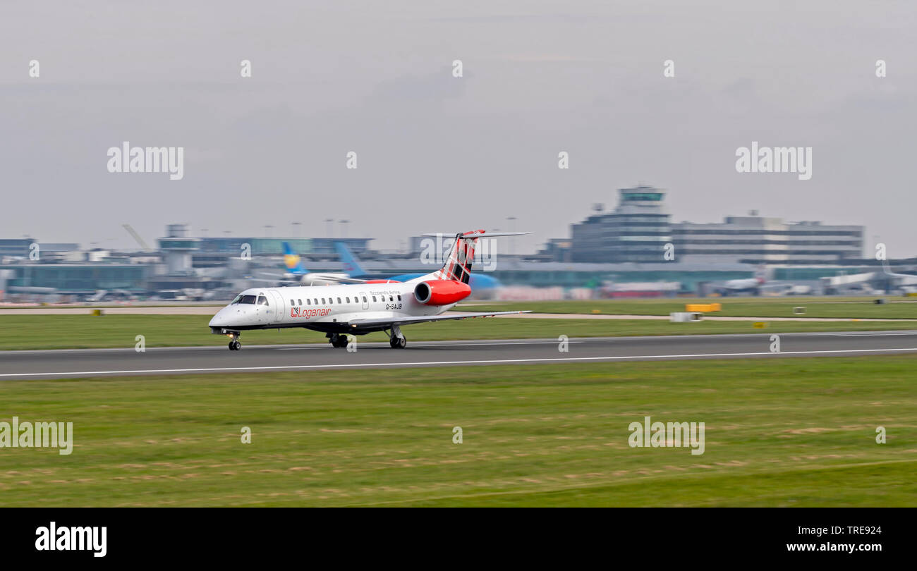 Logan Air,Embraer  ERJ-135ER, G-SAJB,  roliing for take off at Manchester Airport Stock Photo