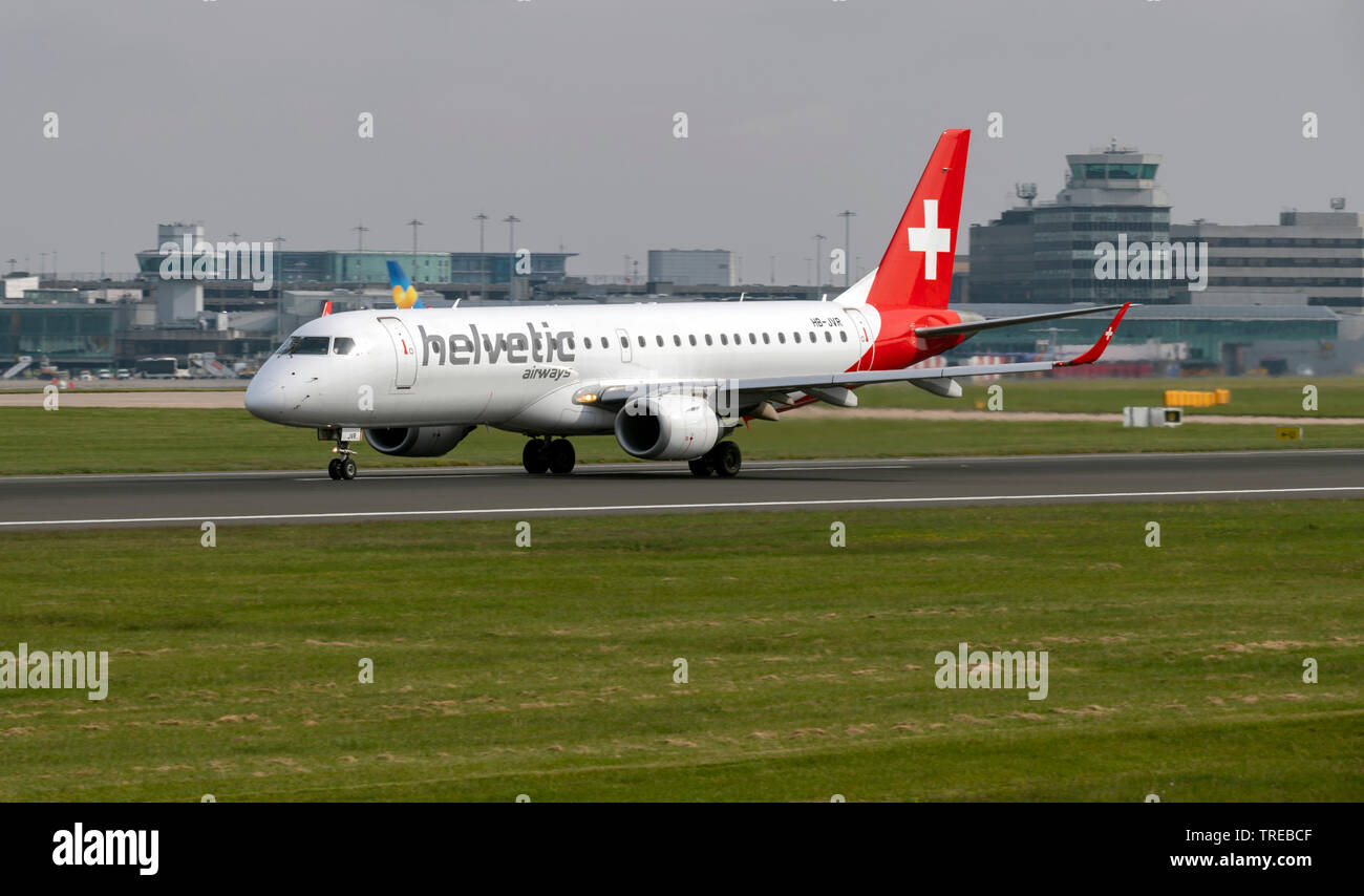 Helvetic Airways Embraer ERJ-190LR, HB-JVR heading for take off at Manchester Airport Stock Photo