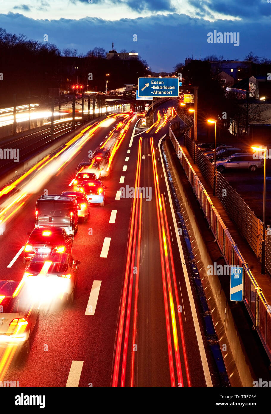 traffic on the motorway A40 in the evening, Germany, North Rhine-Westphalia, Ruhr Area, Essen Stock Photo