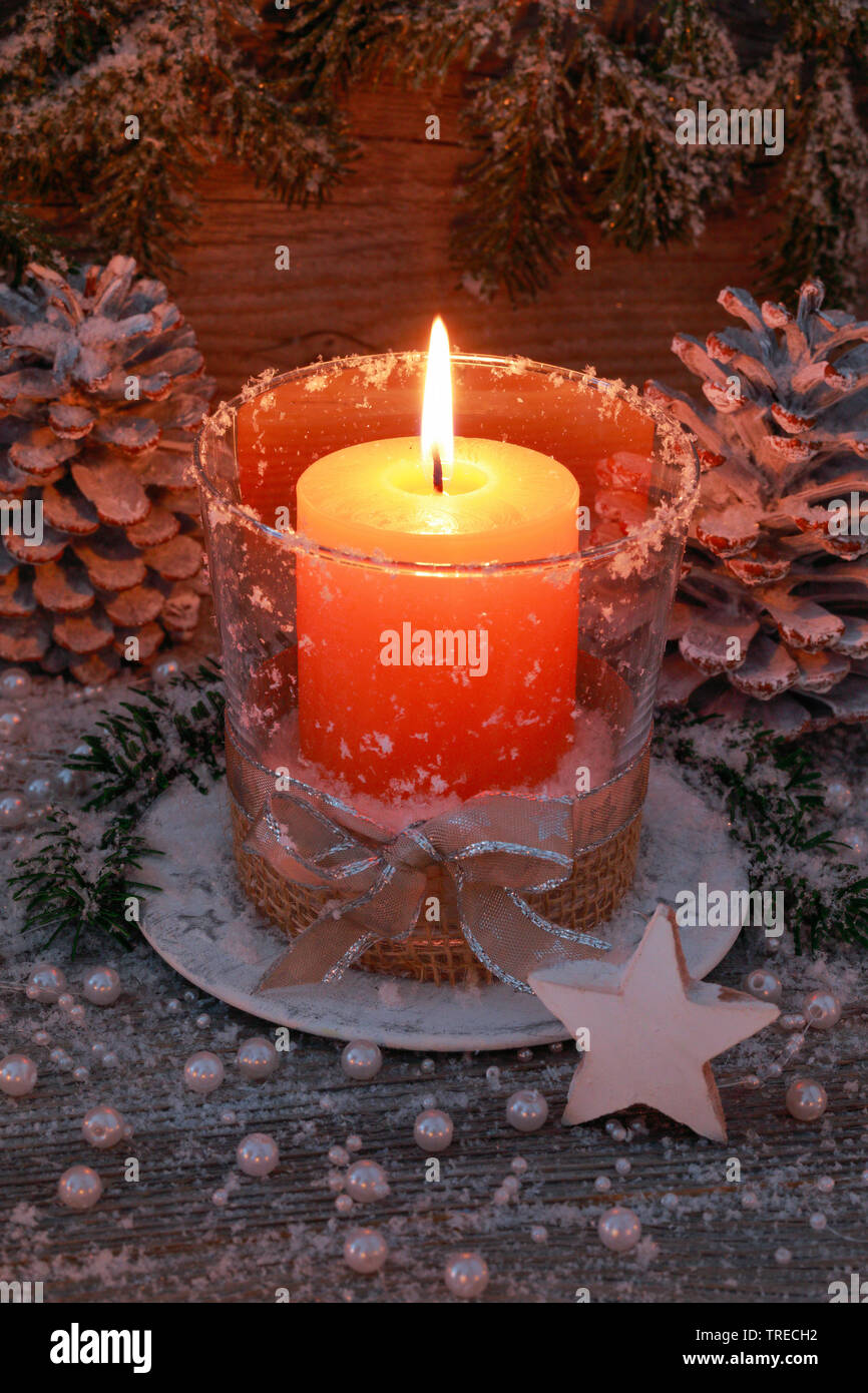 christmas decoration with burning candle, Switzerland Stock Photo