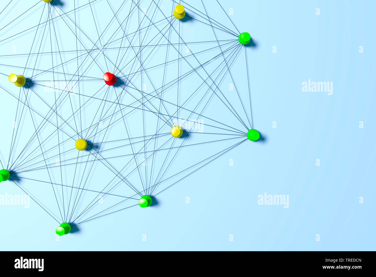 Pins connected with black twines, symbolizing a network structure Stock Photo