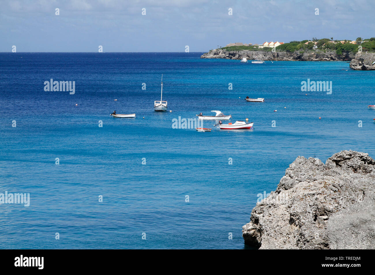 boats anchored off shore, Curacao Stock Photo