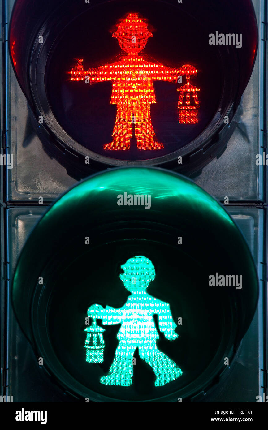red and green pedestrian lights, little traffic-light men in shape of a miner with miner's lamp, Germany, North Rhine-Westphalia, Ruhr Area, Duisburg Stock Photo