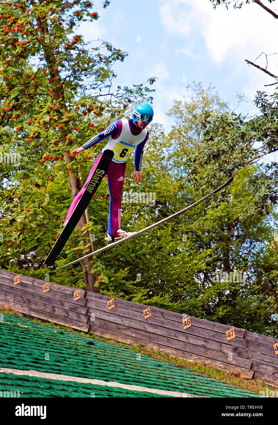 ski jumper in flight, Meinhardus ski jumping hill in summer, Germany, North Rhine-Westphalia, Sauerland, Meinerzhagen Stock Photo