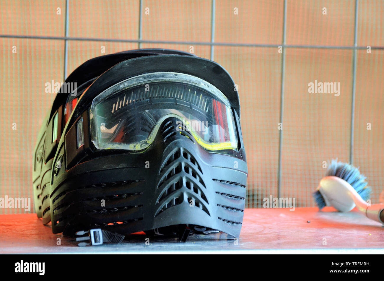 Paintball equipment. A protective helmet, complete with a mask to