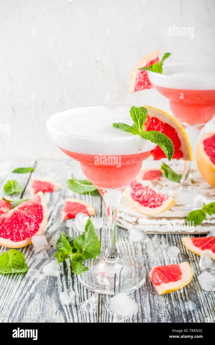 Summer trend alcohol drink. Cold citrus martini cocktail. Aperol spritz, with fresh grapefruit
