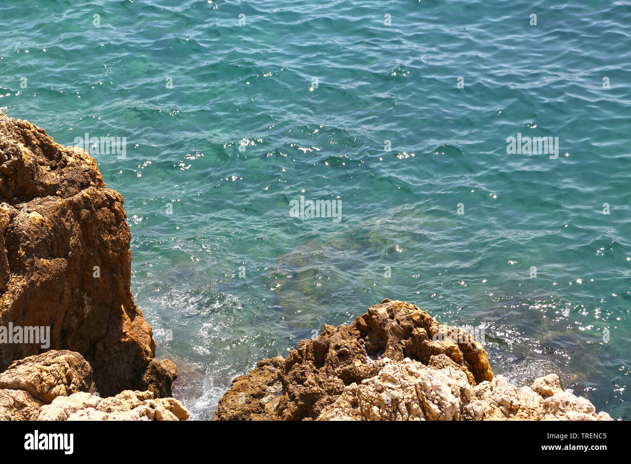 Sea, wave, coastal stones in background Stock Photo - Alamy