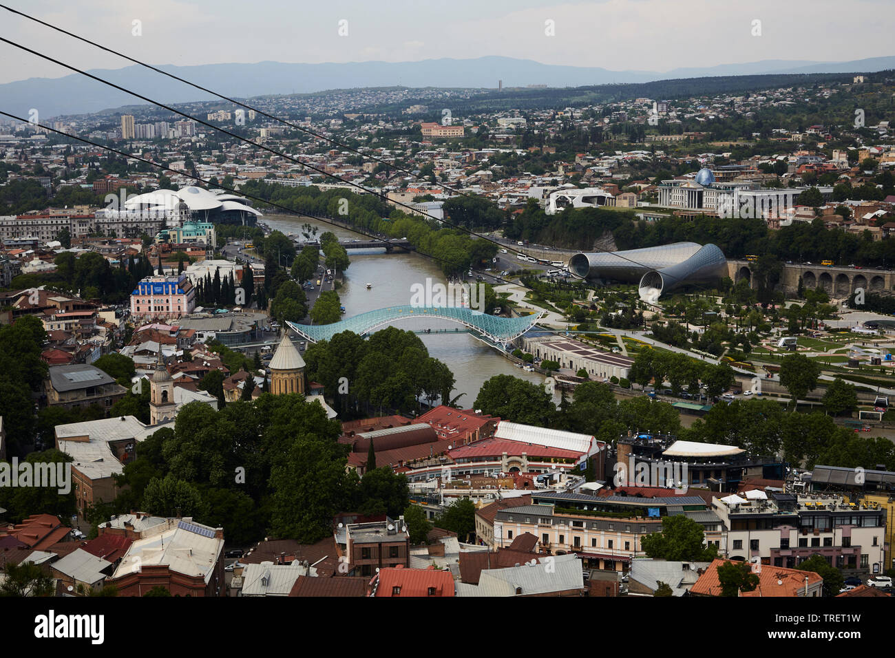 View of Tbilisi and the Peace Brigde. Capital of Georgia Stock Photo