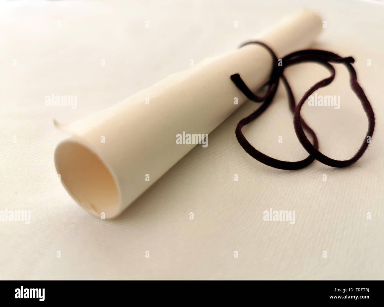 Parchment scroll vellum on a table detail Stock Photo Alamy