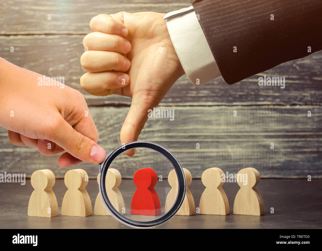 The leader points the finger at the employee. Select a person in a team. Dismissal employee. Reduction of working personnel. Demotion. Bad worker. Cho Stock Photo