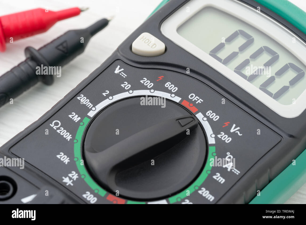 Multimeter measuring device on a light table Stock Photo - Alamy