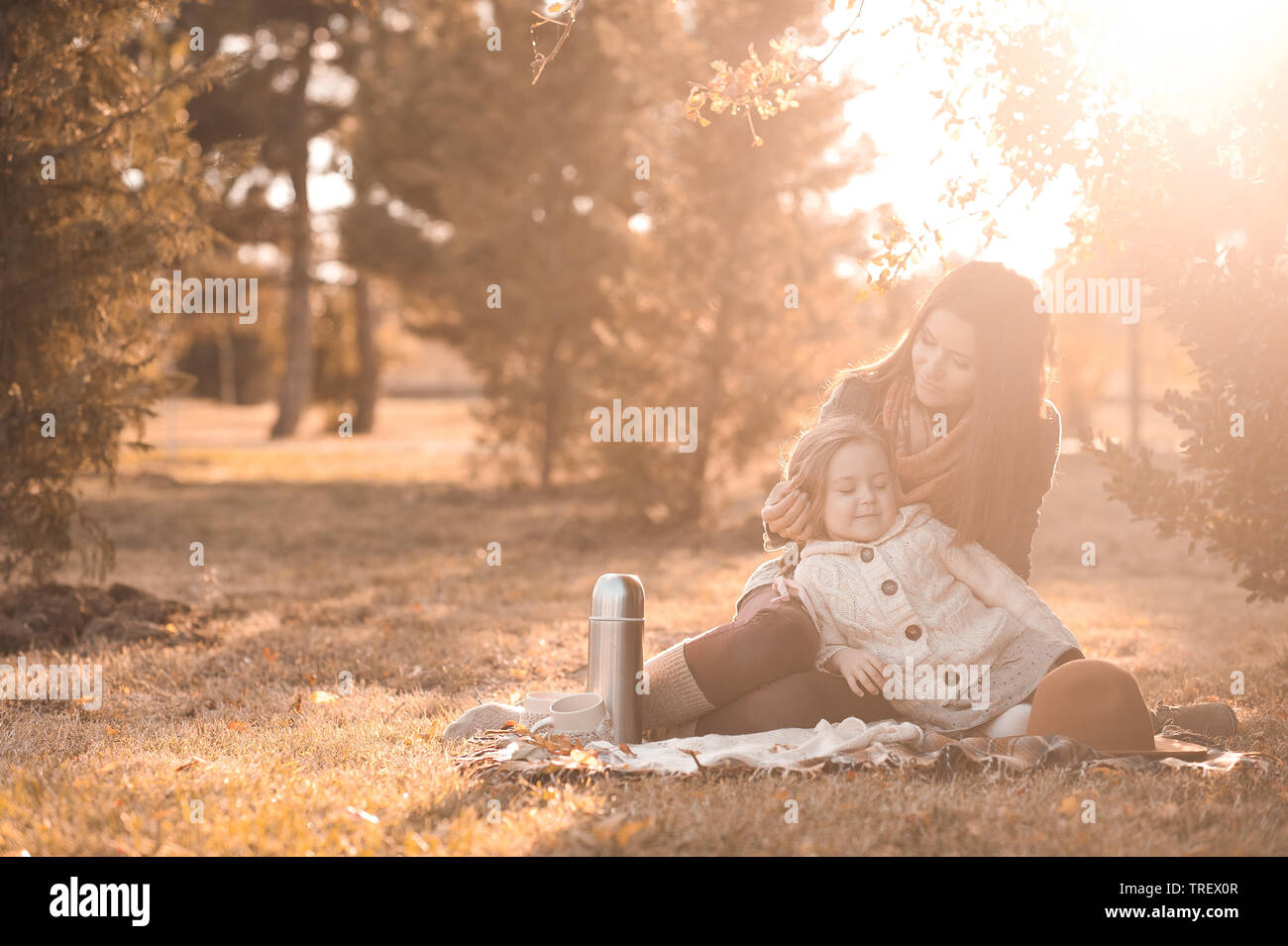 Mother hugs daughter picnic hi-res stock photography and images - Alamy