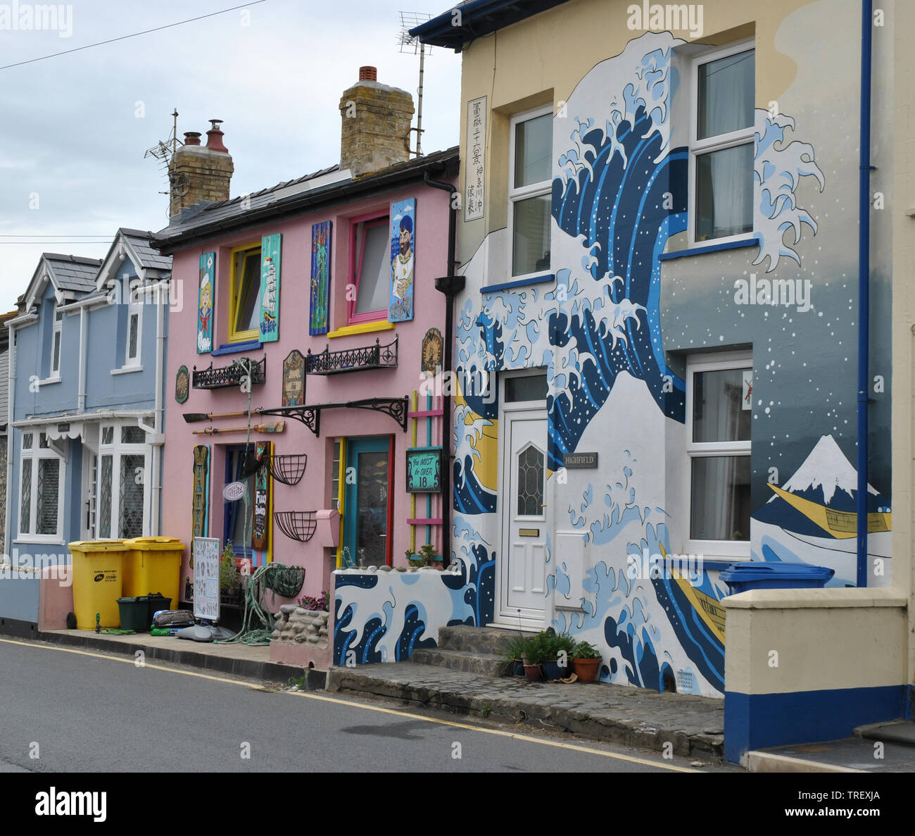 Artistically decorated houses on Borth's high street in Wales, UK Stock Photo