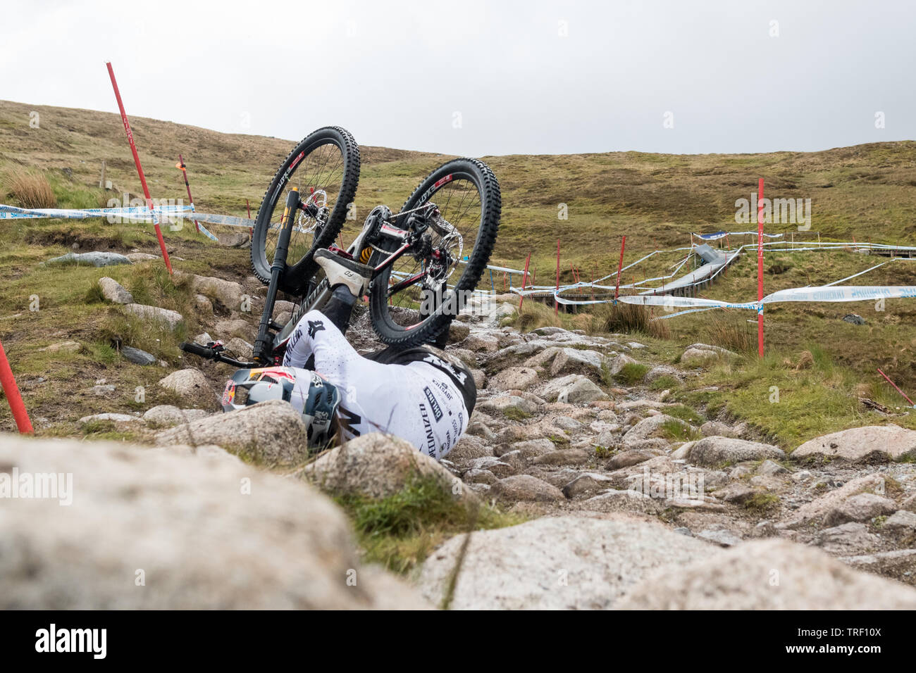 Finn Iles crash sequence during practice run - UCI Mountain Bike World Cup at Fort William, Scotland - series of 13 images  image 11/13 Stock Photo